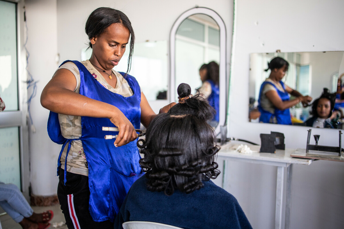 person cutting hair